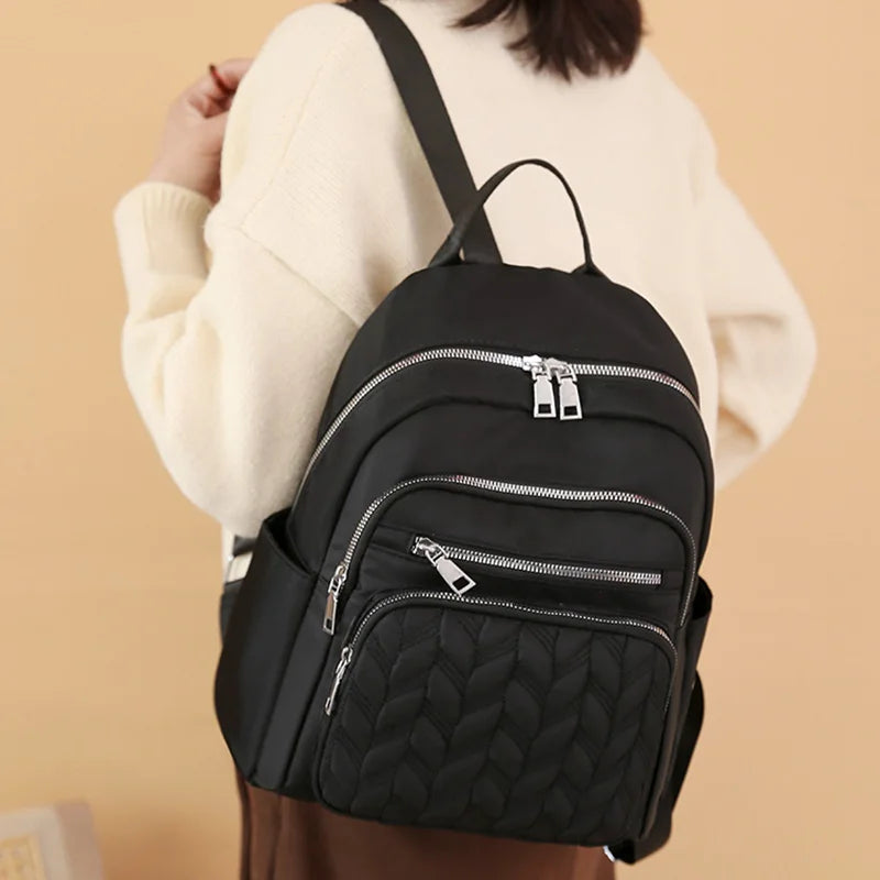 Textured Multi-Pocket Backpack with Front Zippers and Adjustable Shoulder Straps