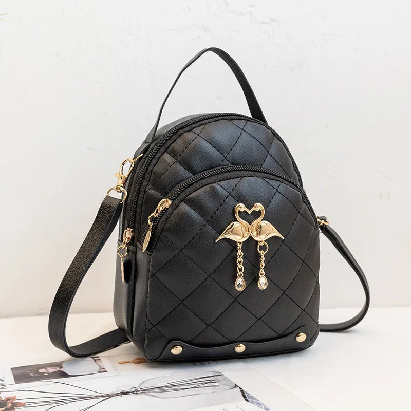 Women's Quilted Mini Backpack with Bow Detail and Top Carry Handle