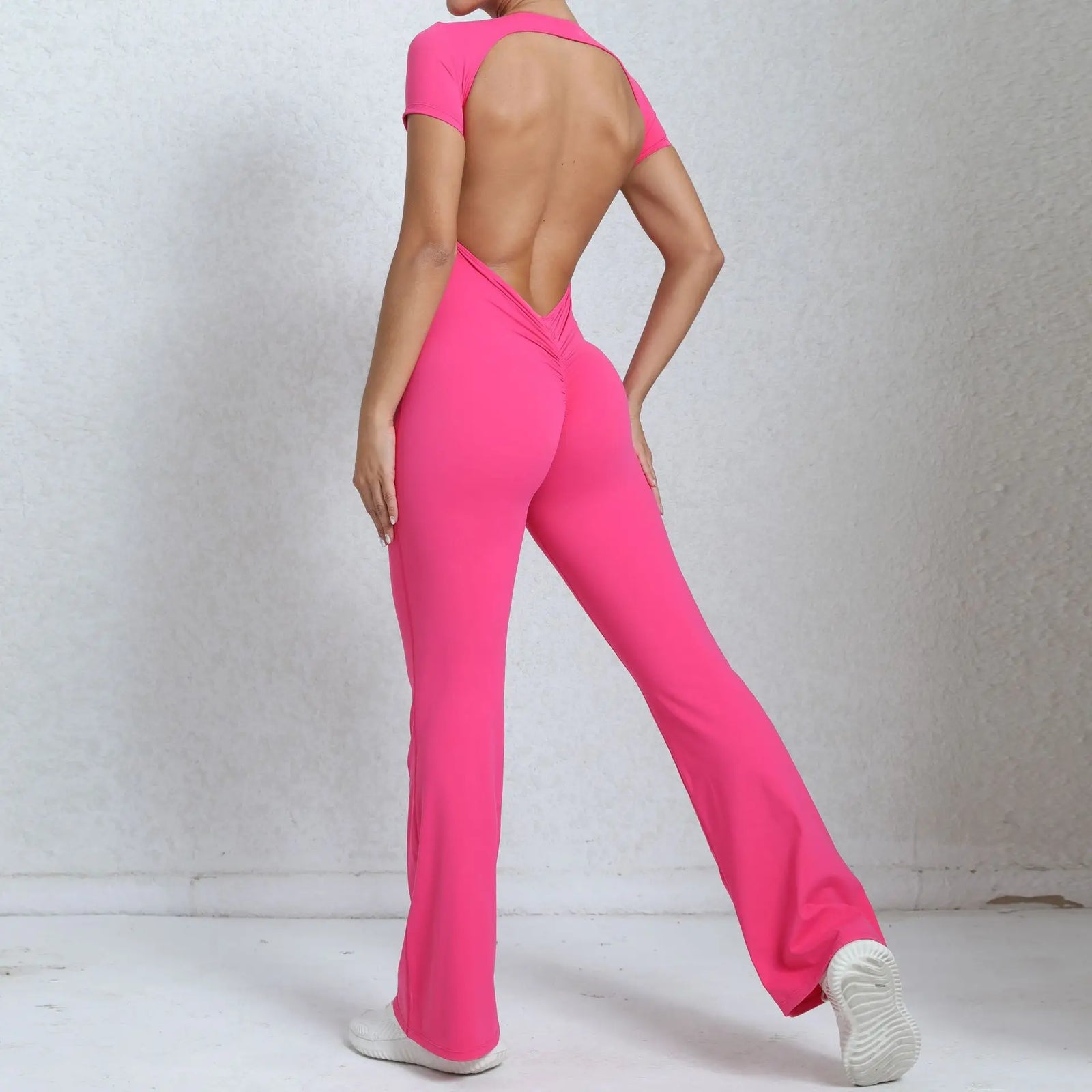 Women's Long Sleeve Nylon Blend Workout Jumpsuit with Open Back