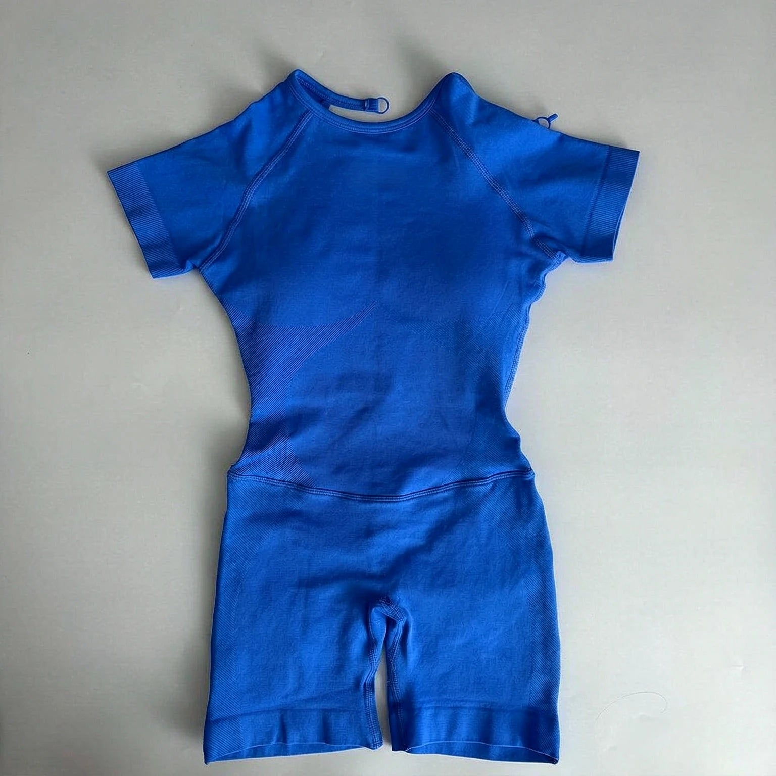 Women's Short Sleeve Polyester Blend Workout Romper with Open Back