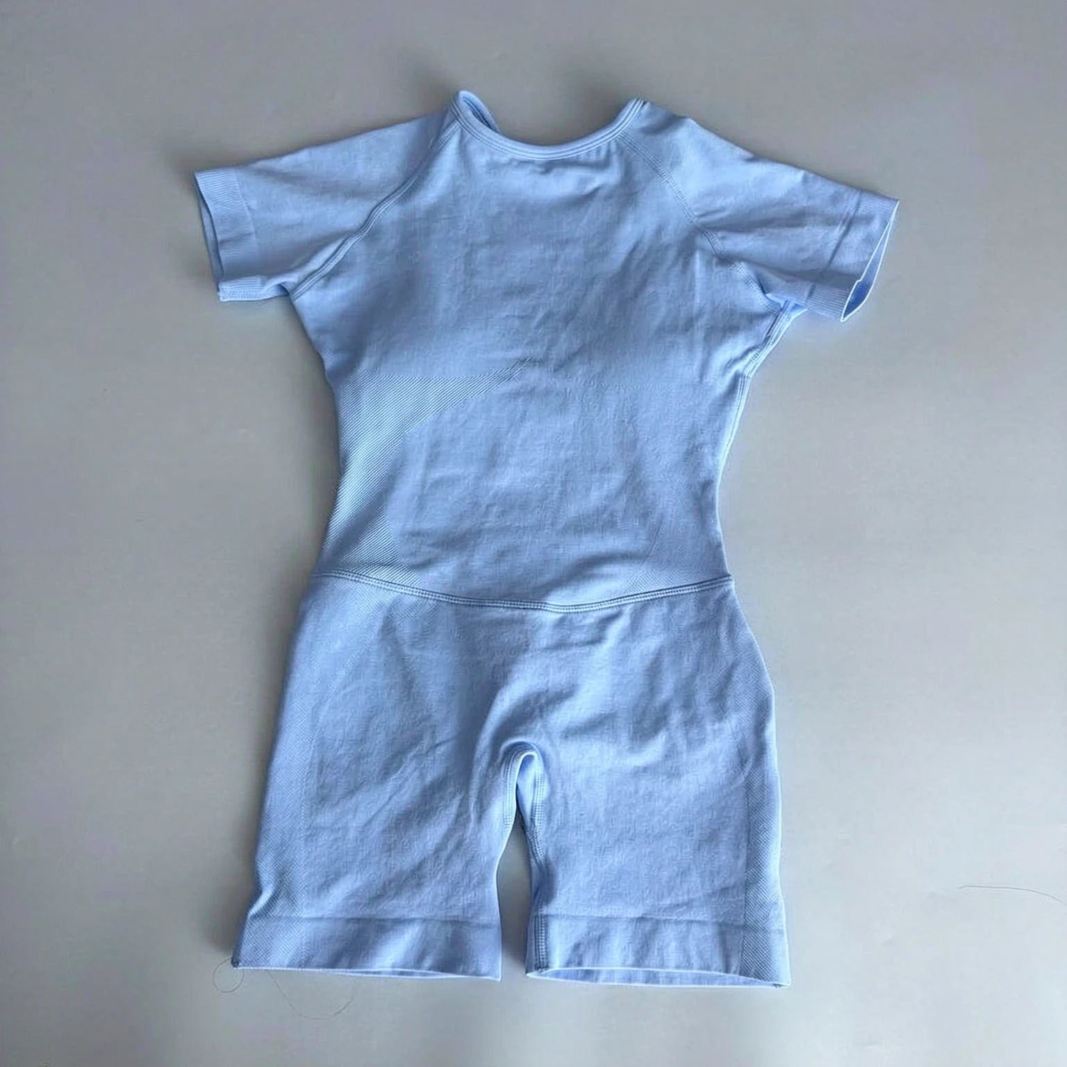 Women's Short Sleeve Polyester Blend Workout Romper with Open Back