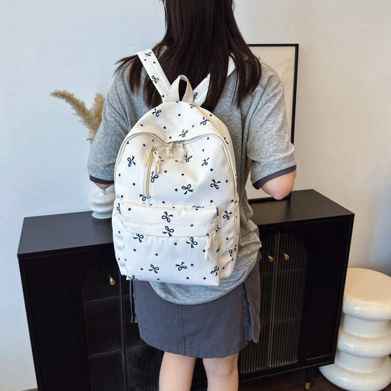Women's Quilted Bow Print Backpack with Front Pocket and Shoulder Straps