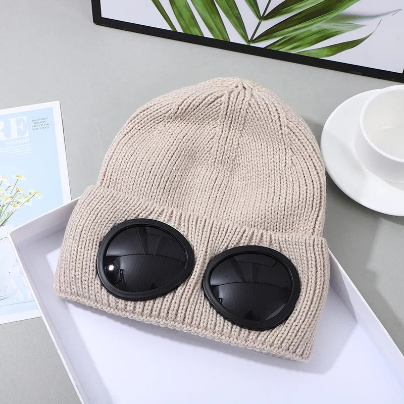 Ribbed Knit Beanie with Decorative Goggle Style Detail