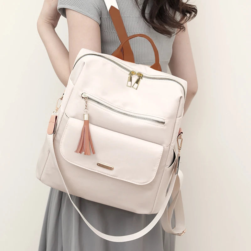 Tassel Detail Backpack with Front Pockets and Adjustable Shoulder Strap Design