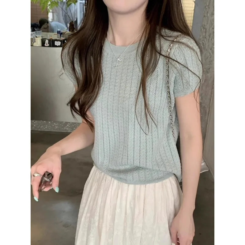 A hollowed-out round-neck ice silk knitted T-shirt for women in summer, a loose short-sleeved and slimming top, is thin