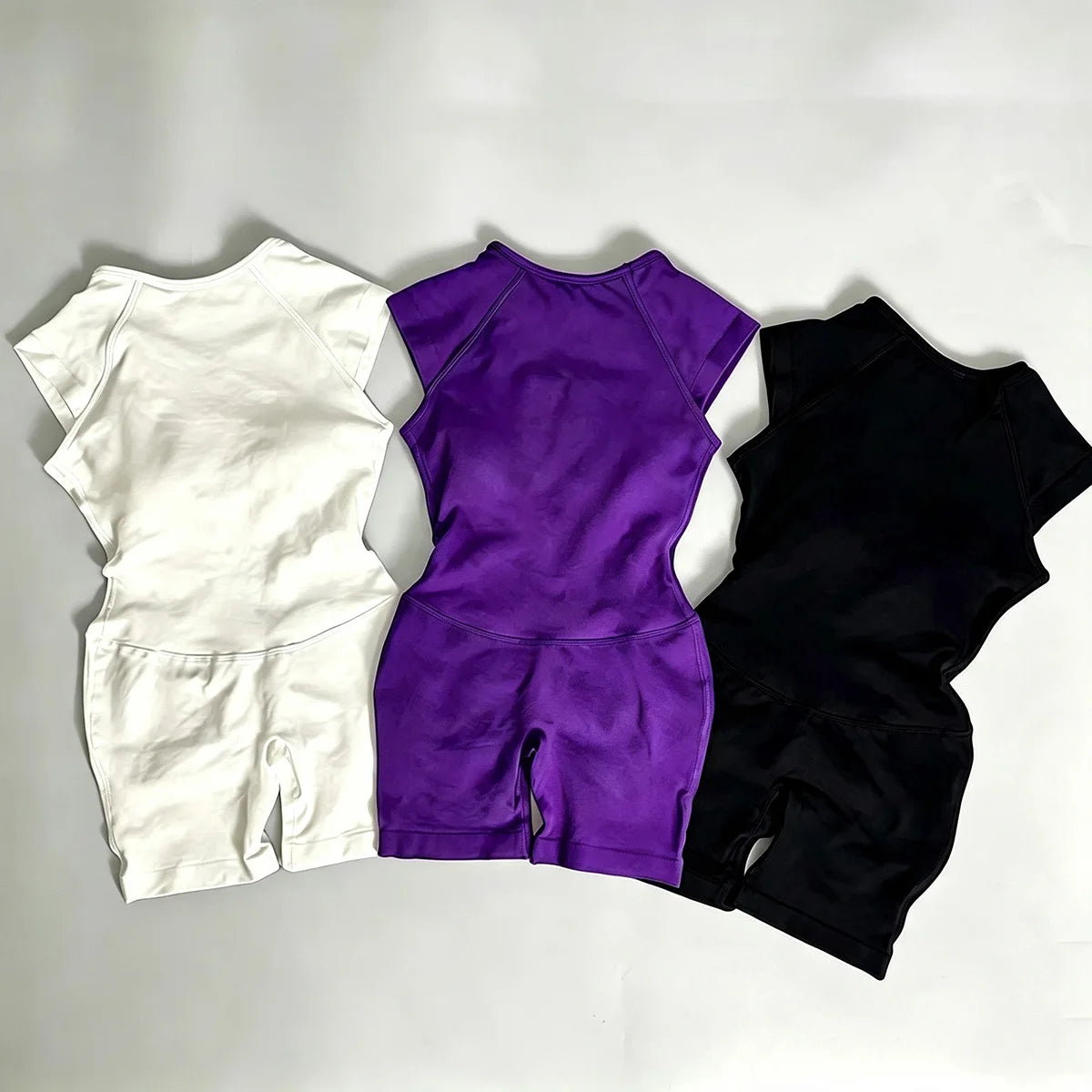 Women's Open Back Nylon Blend Workout Romper with Short Sleeve Styles