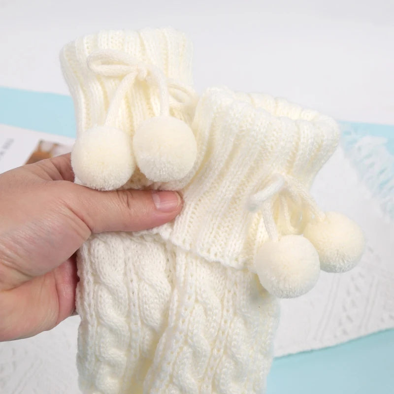 Cable Knit Leg Warmers with Decorative Bow and Pom Details