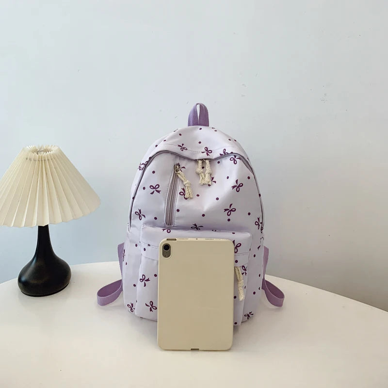 Women's Quilted Bow Print Backpack with Front Pocket and Shoulder Straps