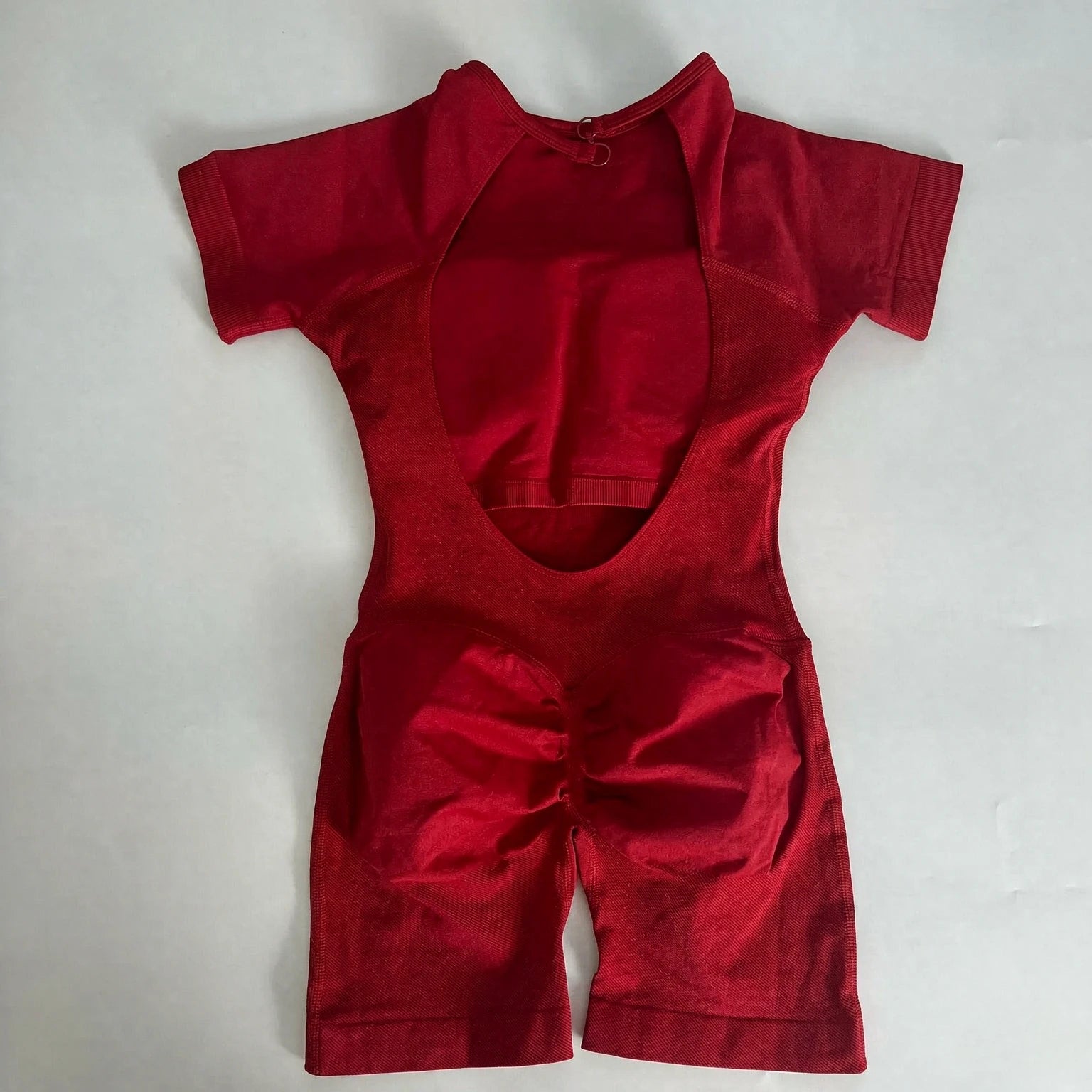 Women's Short Sleeve Polyester Blend Workout Romper with Open Back