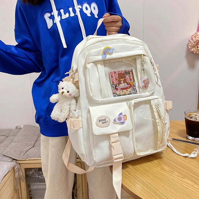 Multi-Pocket Student Backpack with Transparent Display Panels and Side Strap Details