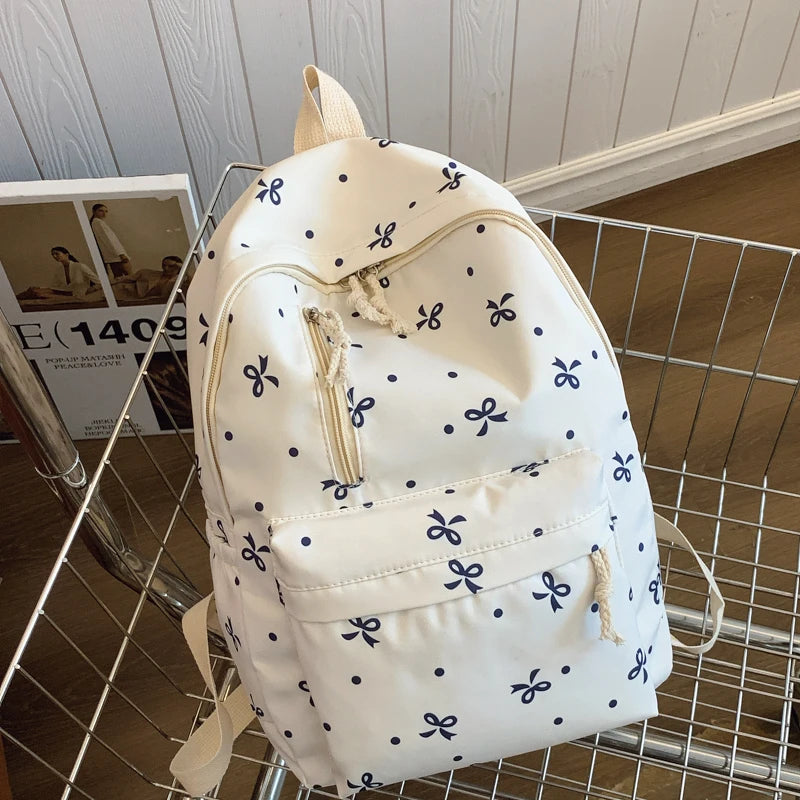 Women's Quilted Bow Print Backpack with Front Pocket and Shoulder Straps