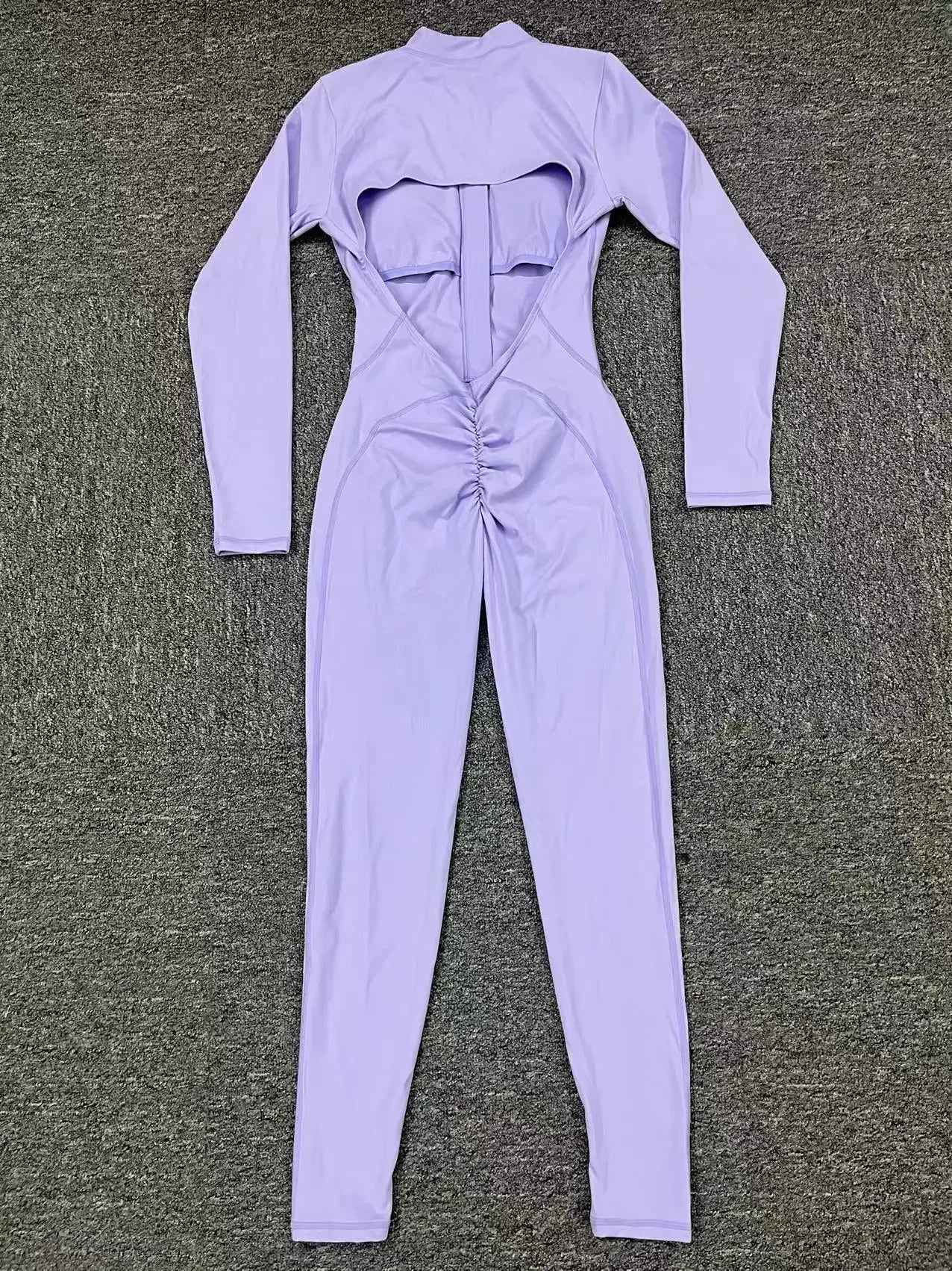Women's Long Sleeve Nylon Blend Workout Jumpsuit with Zip and Back Cutout