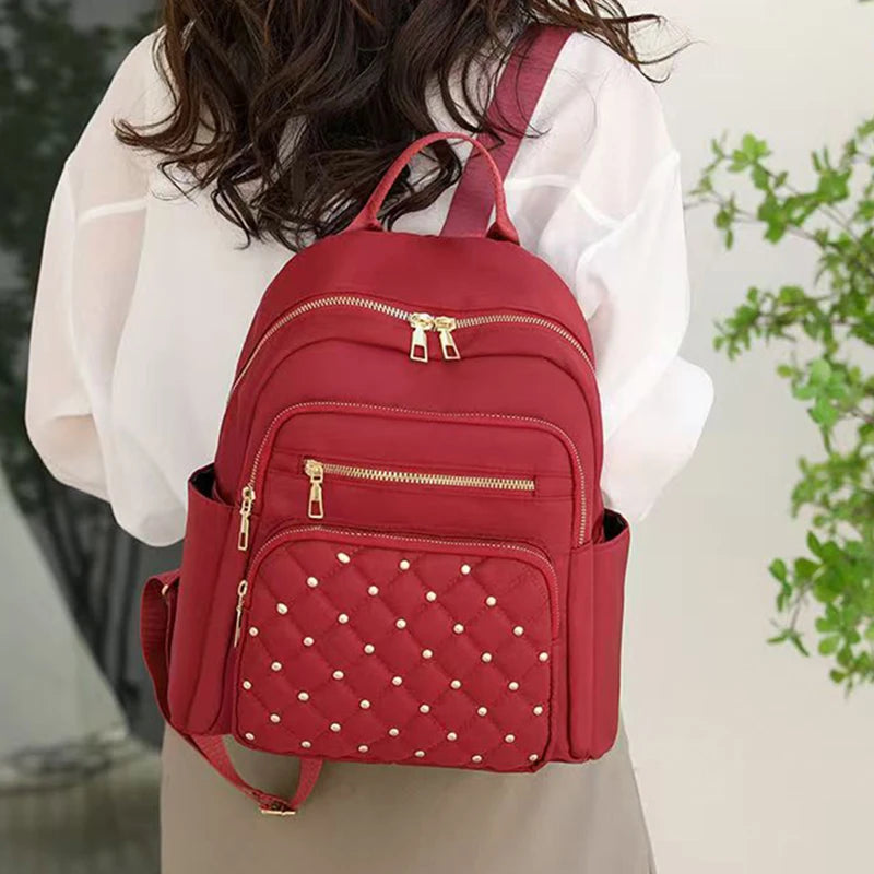 Quilted Front Backpack with Stud Details and Adjustable Shoulder Carry Straps