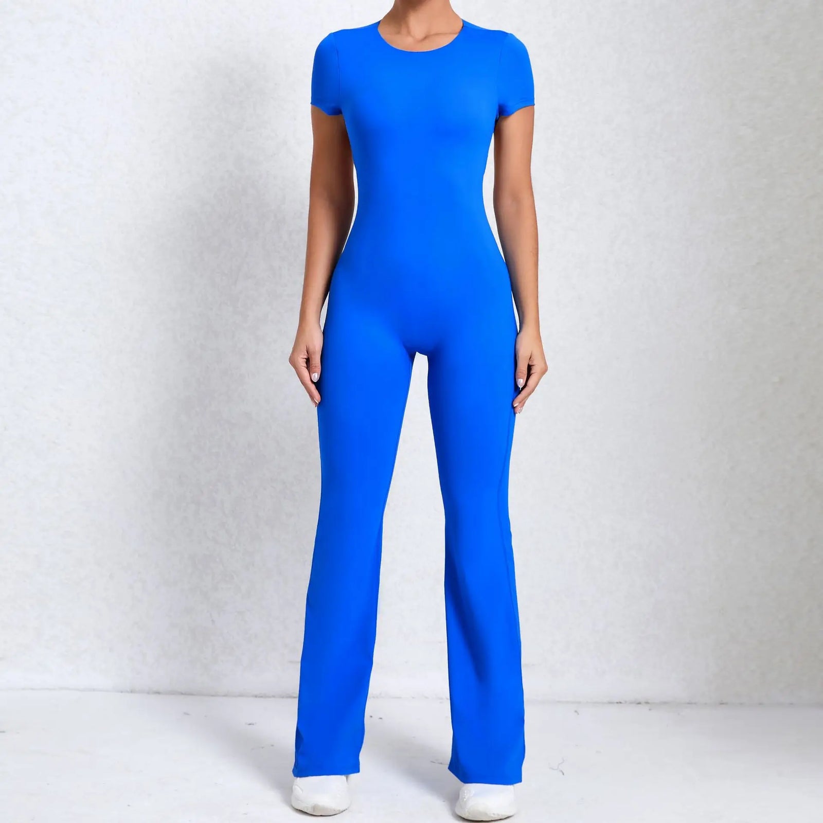 Women's Long Sleeve Nylon Blend Workout Jumpsuit with Open Back