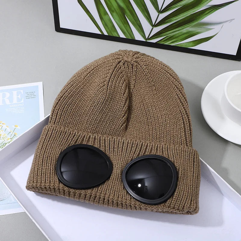 Ribbed Knit Beanie with Decorative Goggle Style Detail