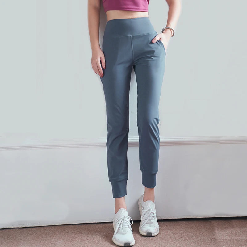Women's High Waist Nylon Blend Workout Pants with Cuffed Ankles and Pockets