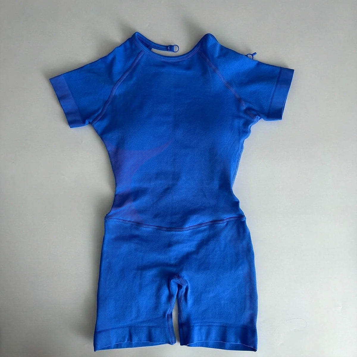 Women's Short Sleeve Polyester Blend Workout Romper with Open Back