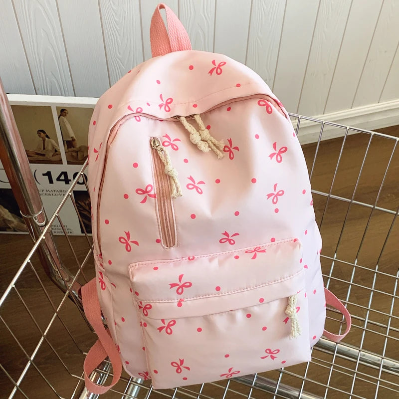 Women's Quilted Bow Print Backpack with Front Pocket and Shoulder Straps