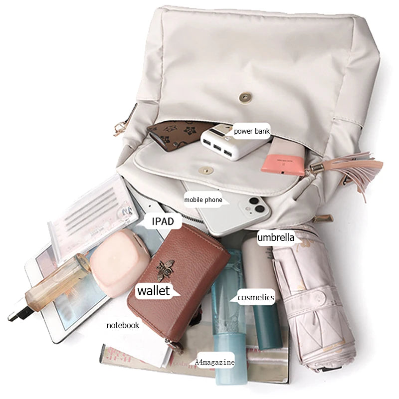 Tassel Detail Backpack with Front Pockets and Adjustable Shoulder Strap Design