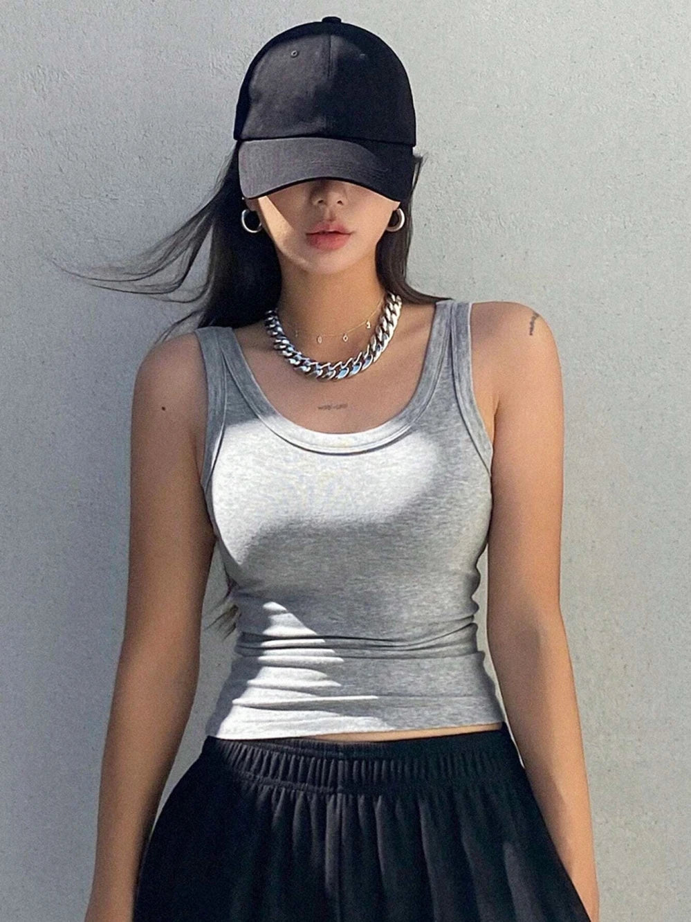 Women's Fitted Tank Top with Ribbed Construction and a Sleeveless Design