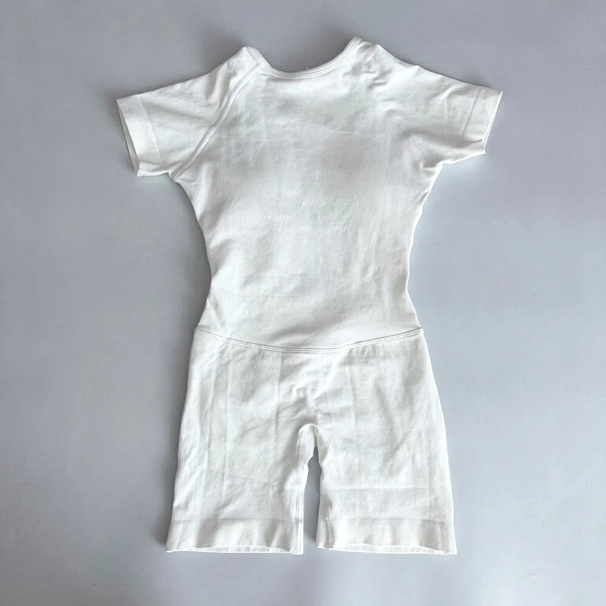 Women's Short Sleeve Polyester Blend Workout Romper with Open Back