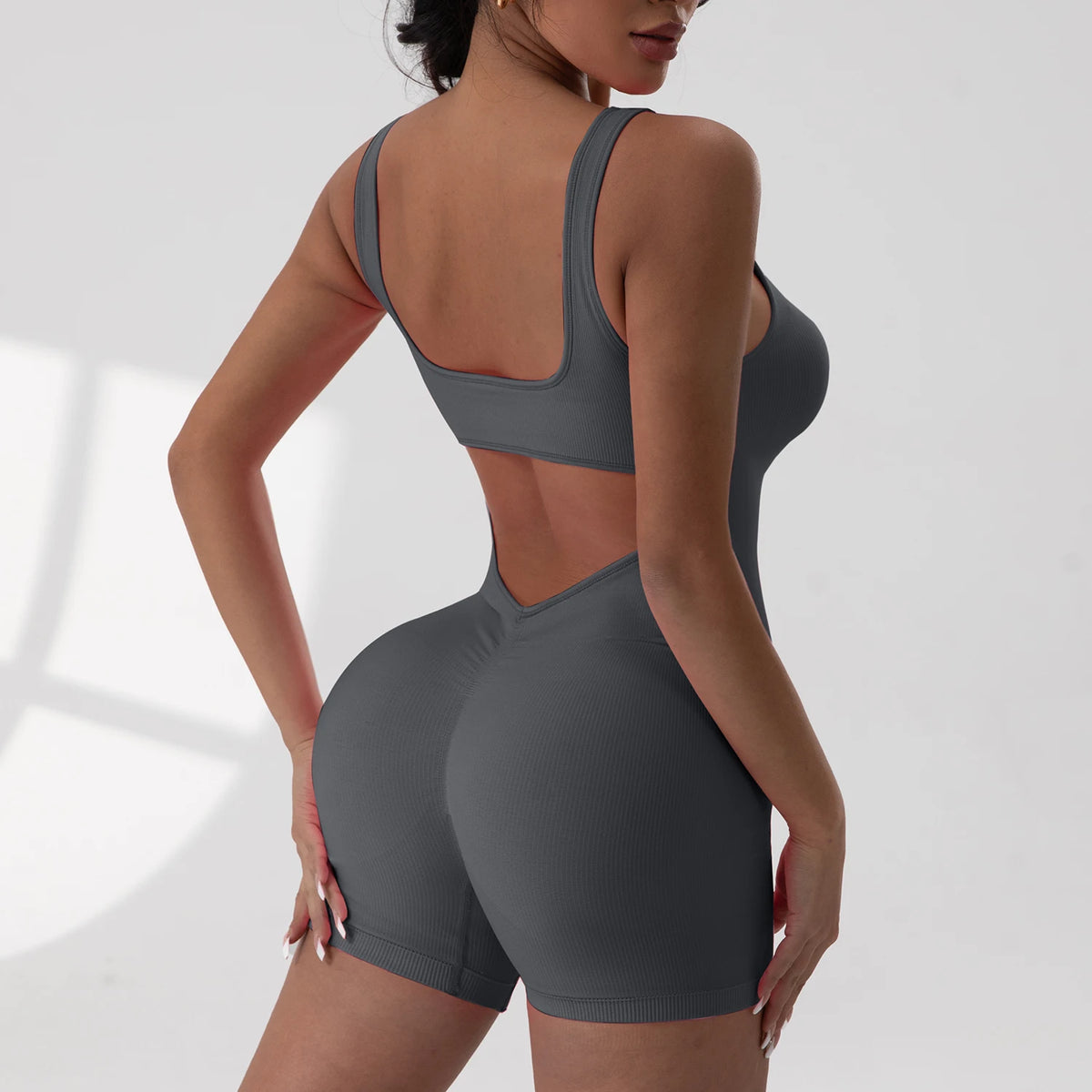Women's Open Back Nylon Blend Workout Romper in Plain and Printed Styles