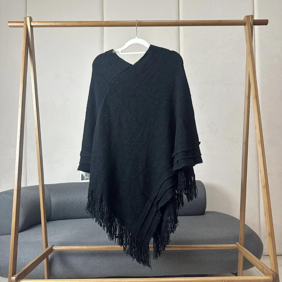 Knit Fringe Hem Poncho for Layering over Outfits