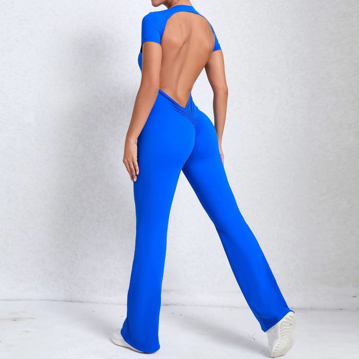 Women's Long Sleeve Nylon Blend Workout Jumpsuit with Open Back
