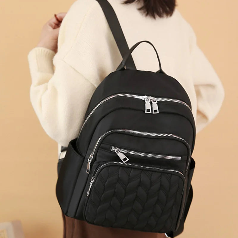 Women's Textured Backpack with Front Zipper Pockets and Adjustable Straps