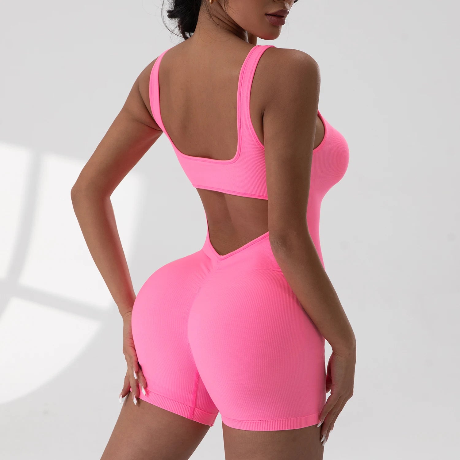 Women's Open Back Nylon Blend Workout Romper in Plain and Printed Styles