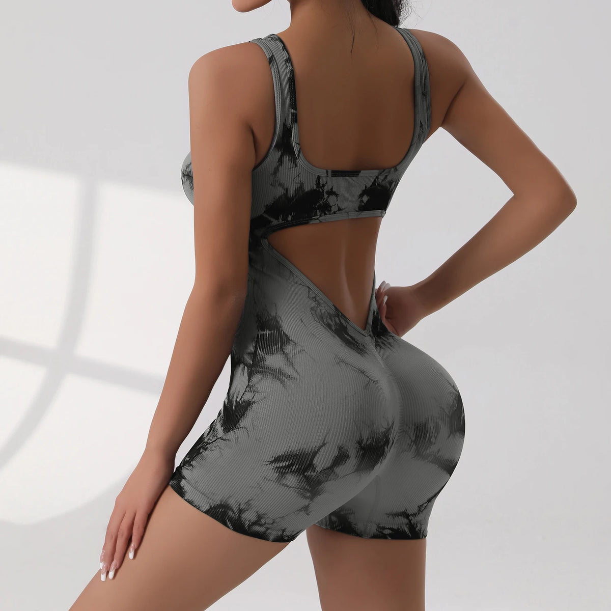 Women's Open Back Nylon Blend Workout Romper in Plain and Printed Styles
