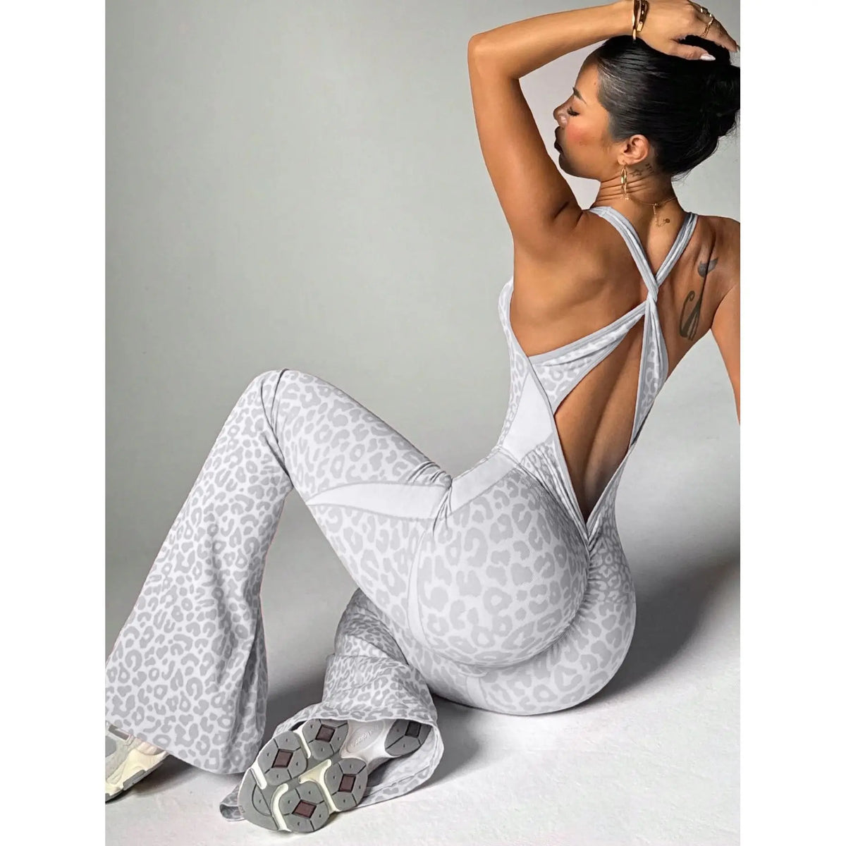 Women's Leopard Print Polyester Workout Jumpsuit with Flared Full Length Legs