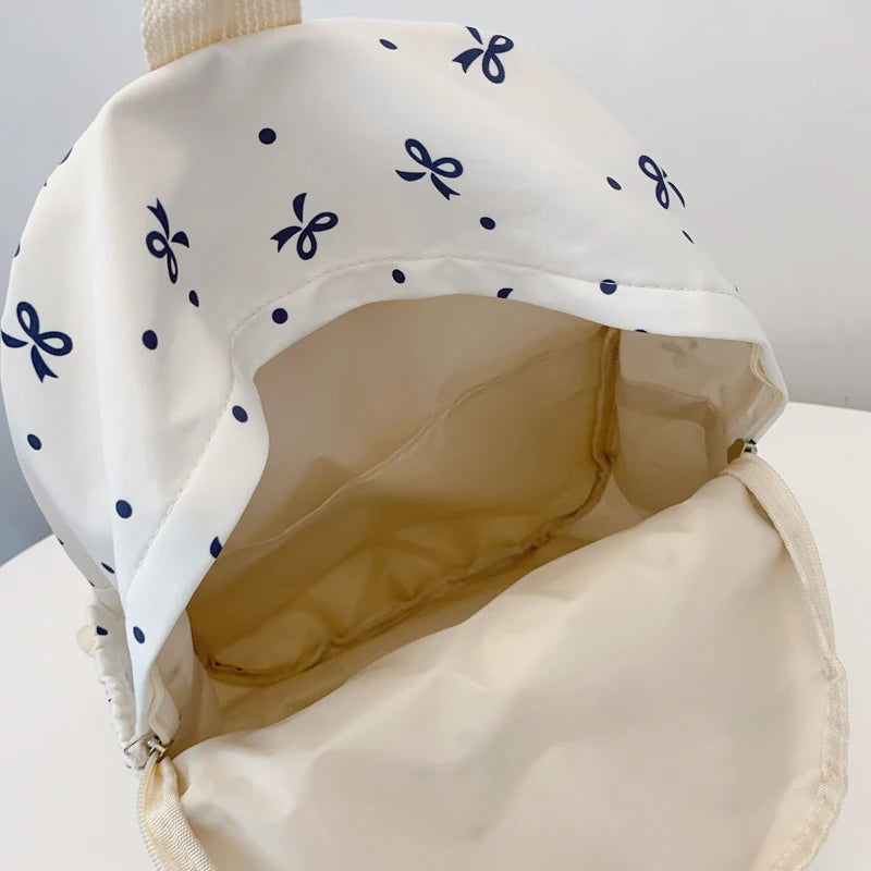 Women's Quilted Bow Print Backpack with Front Pocket and Shoulder Straps