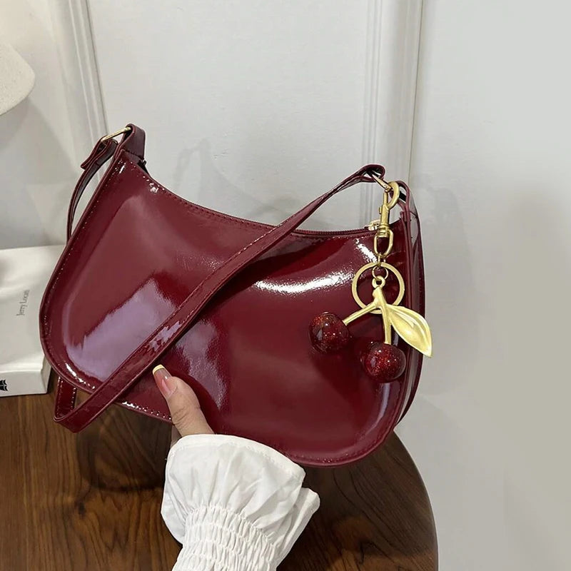Solid Shoulder Handbag with Decorative Cherry Pendant Detail