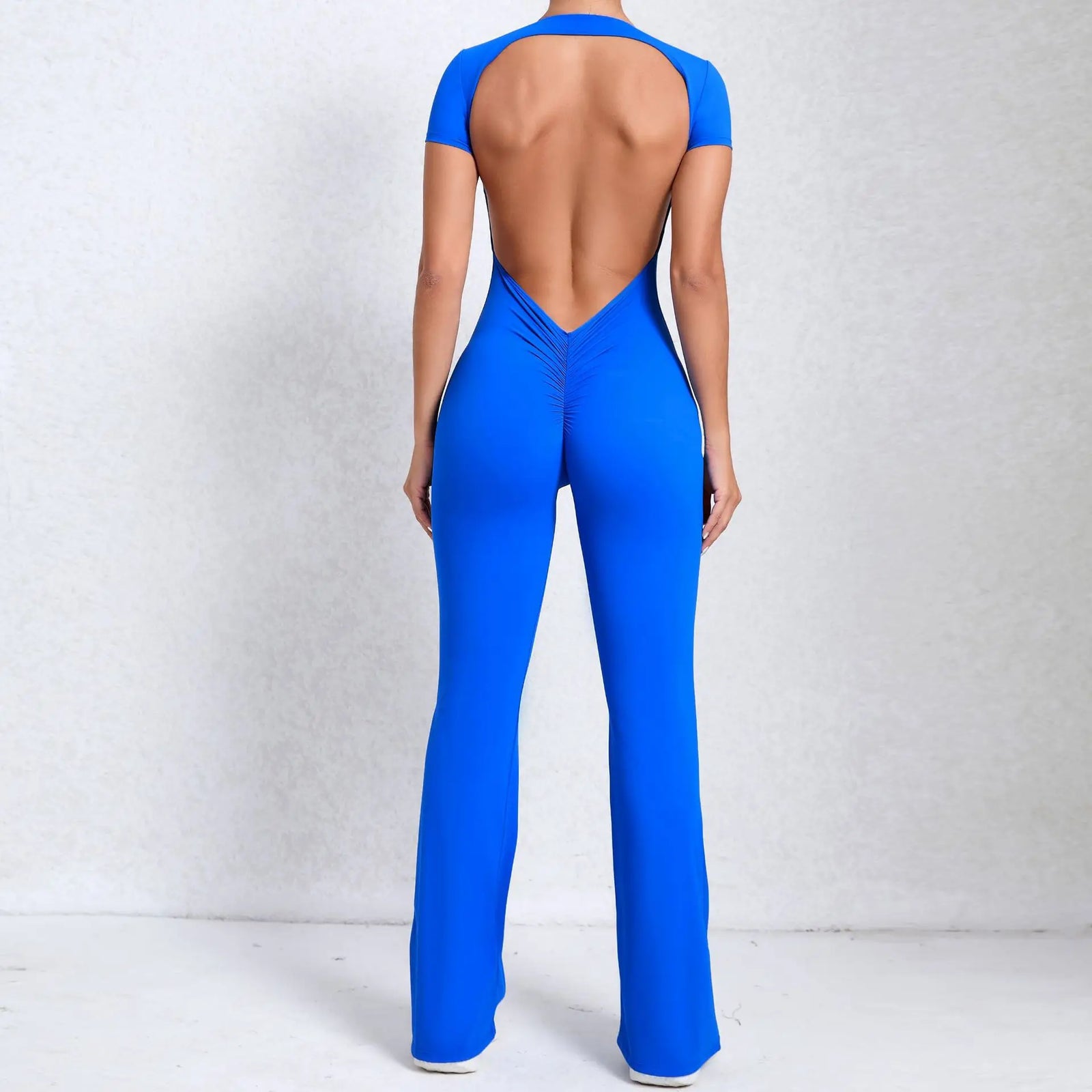 Women's Long Sleeve Nylon Blend Workout Jumpsuit with Open Back