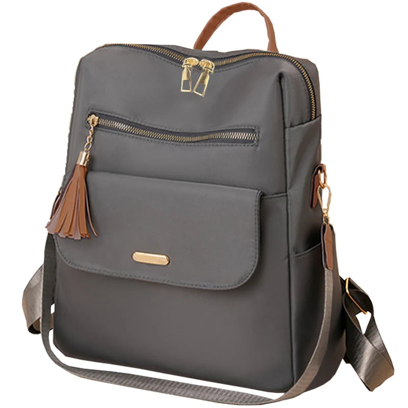 Tassel Detail Backpack with Front Pockets and Adjustable Shoulder Strap Design