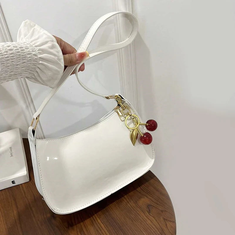 Solid Shoulder Handbag with Decorative Cherry Pendant Detail