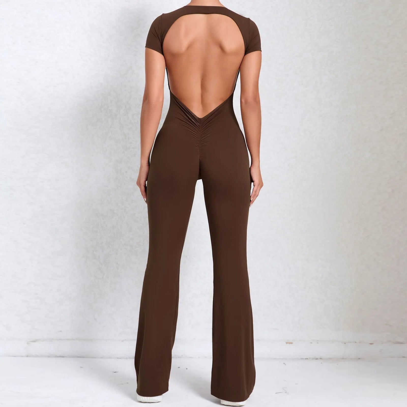 Women's Long Sleeve Nylon Blend Workout Jumpsuit with Open Back