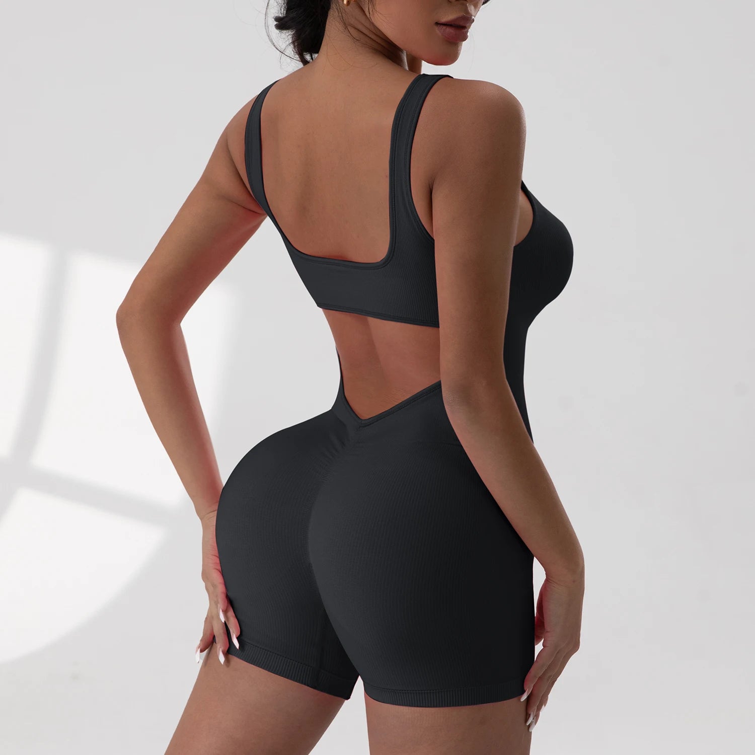 Women's Open Back Nylon Blend Workout Romper in Plain and Printed Styles