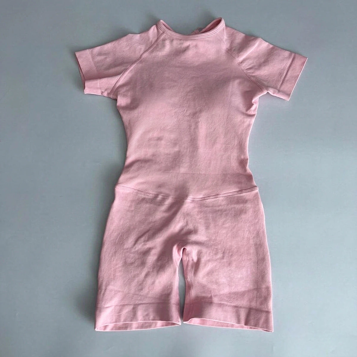Women's Short Sleeve Polyester Blend Workout Romper with Open Back