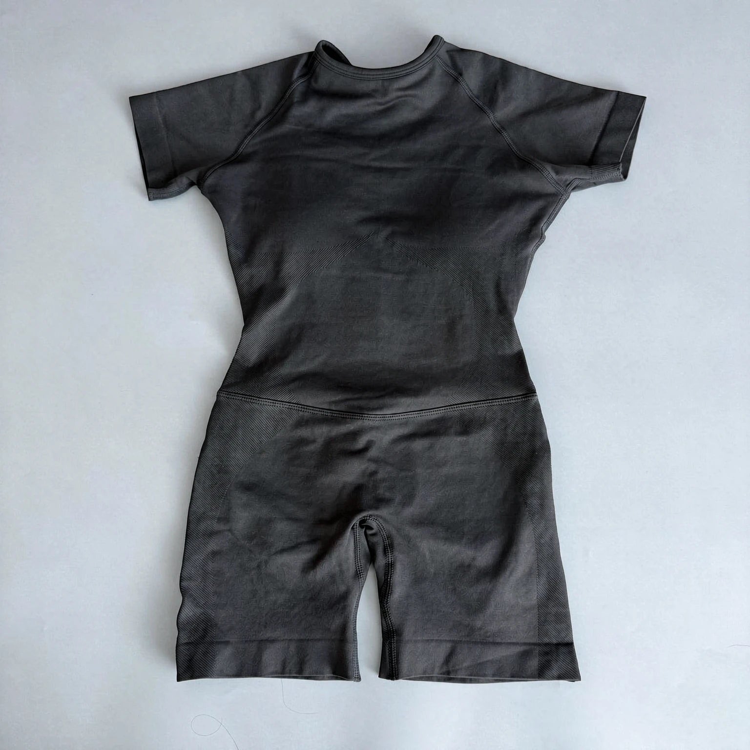 Women's Short Sleeve Polyester Blend Workout Romper with Open Back