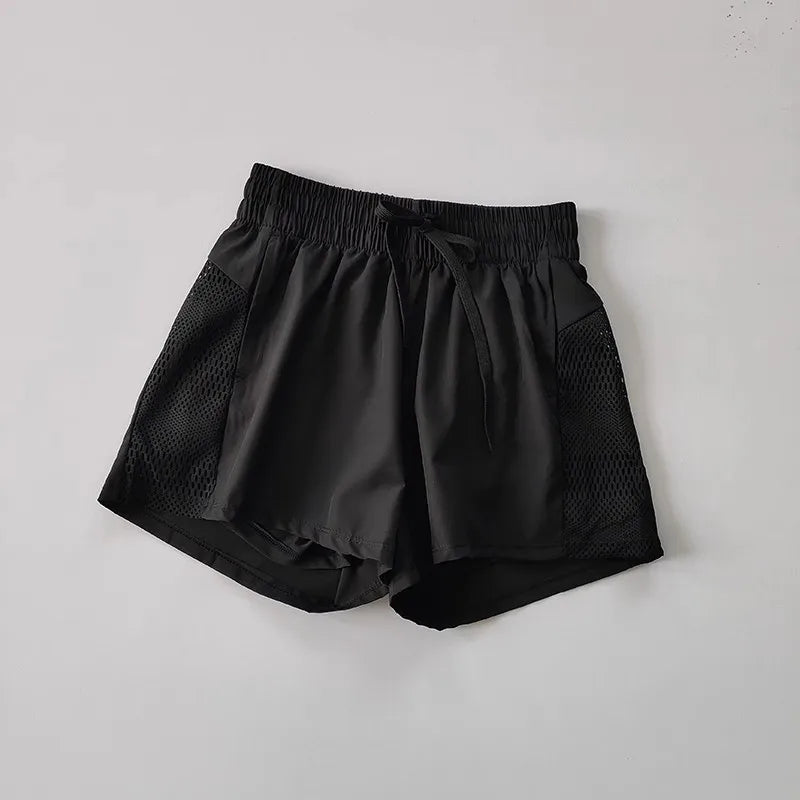 Women's Loose Fit Sports Shorts with Mesh Panels and Side Pockets