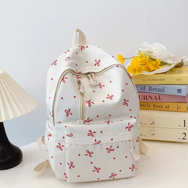 Women's Quilted Bow Print Backpack with Front Pocket and Shoulder Straps