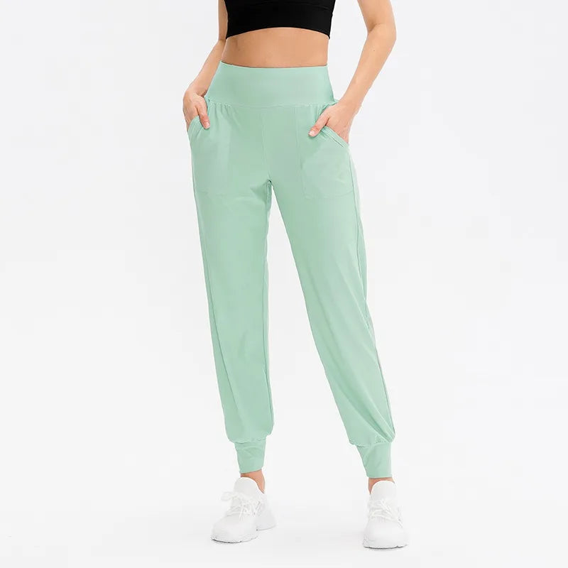 Women's High Waist Nylon Blend Workout Pants with Side Pockets and Cuffed Ankles