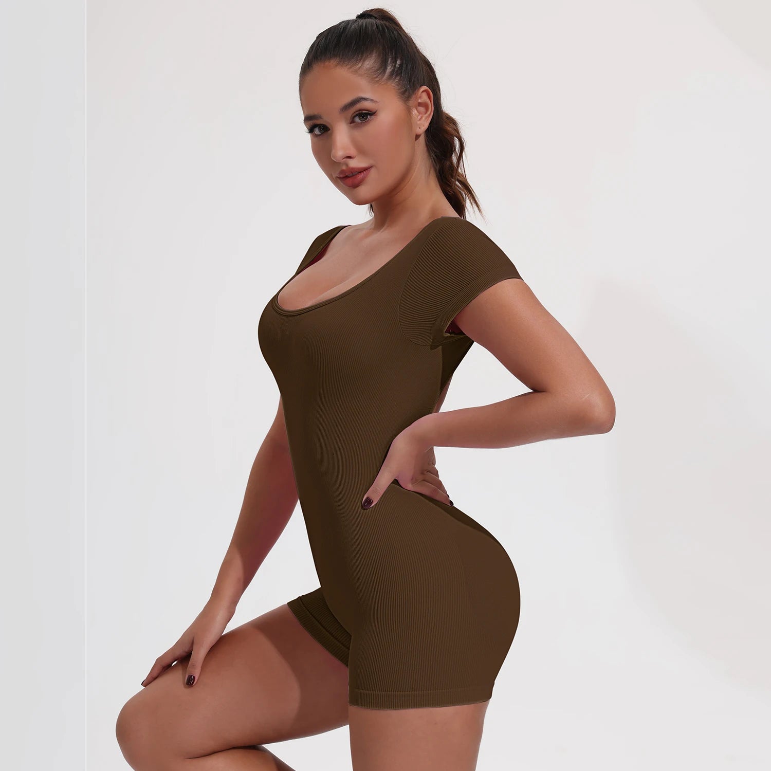 Women's Scoop Neck Nylon Blend Romper with Cap Sleeves and Open Back