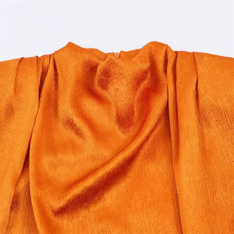 Women's Sleeveless Blouse with a Draped Neckline and Long Ribbon Ties