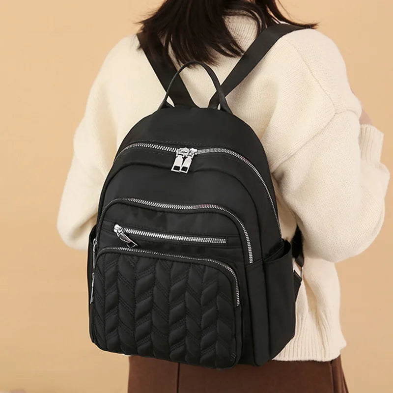 Women's Textured Backpack with Front Zipper Pockets and Adjustable Straps