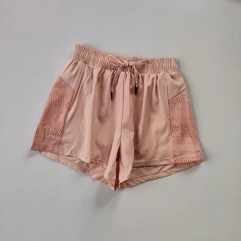 Women's Loose Fit Sports Shorts with Mesh Panels and Side Pockets