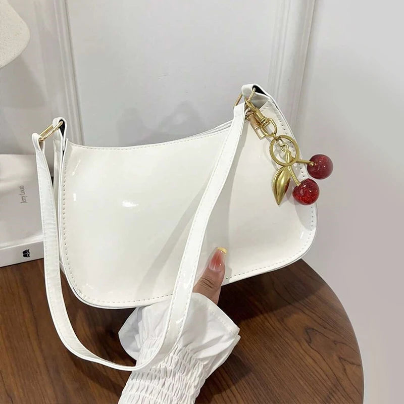 Solid Shoulder Handbag with Decorative Cherry Pendant Detail