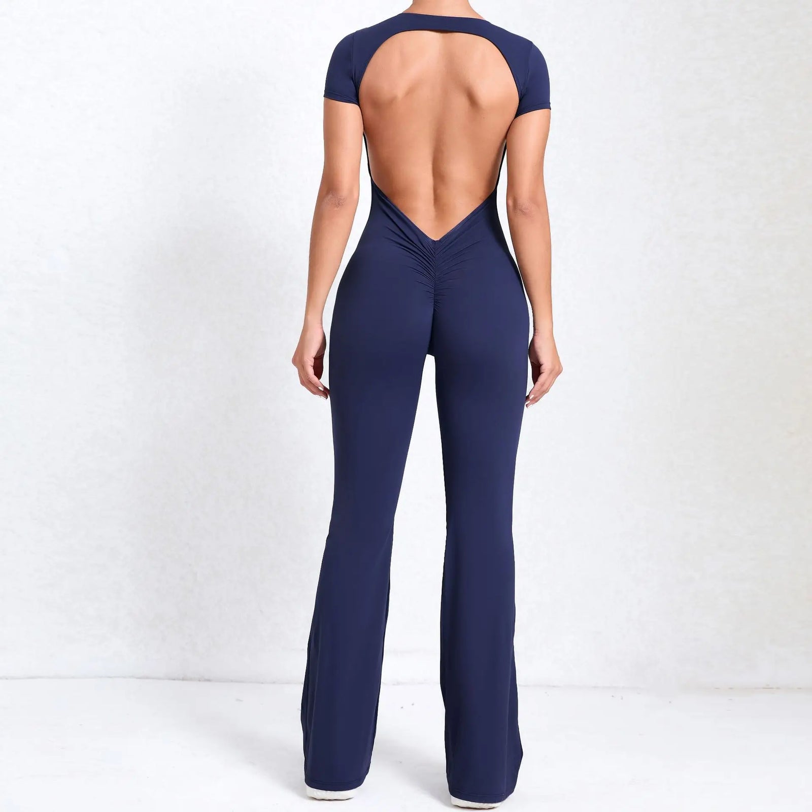 Women's Long Sleeve Nylon Blend Workout Jumpsuit with Open Back
